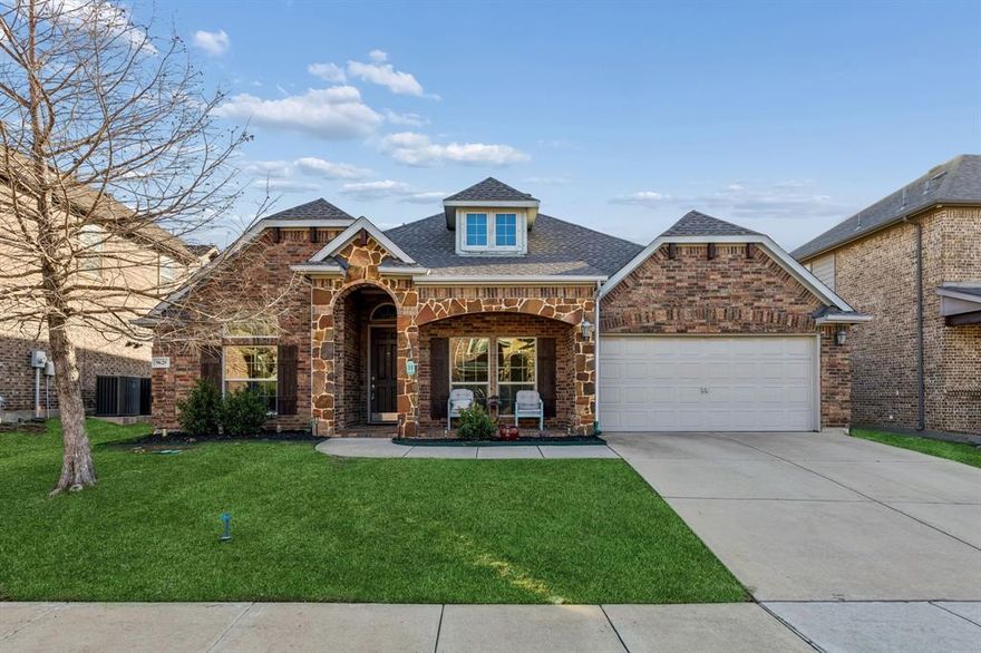 OPEN HOUSE ON 03.21 SATURDAY AT 12-4PM! *COMING SOON!!*NORTHWEST-ISD!!*1.5 STORY FLOORPLN!!*4 BEDS PLUS BONUS ROOM!!*
Situated in a desirable community with playgrounds, a community pool, and walking and jogging paths, and zoned for highly rated Northwest ISD, this well-maintained 4-bedroom, 2-bath home features a thoughtfully designed 1.5-story layout with all bedrooms downstairs and a spacious upstairs bonus room. A covered front porch adds curb appeal, while expansive windows bring in natural light, creating a warm and functional interior.
At the heart of the home, the kitchen features dark granite countertops, multi-tone natural slate tile flooring, a gas cooktop and oven, a large center island, a butler’s pantry, and a generous walk-in pantry—ideal for everyday living and entertaining. The adjoining living area is anchored by a striking floor-to-ceiling stone, wood-burning fireplace with a gas starter, raised hearth, and wood mantel, creating a cozy focal point.
The versatile floorplan includes a dedicated office or flex space with rich wood flooring and a detailed accent wall, along with a formal dining area for hosting. The private primary suite features a bay window sitting area filled with natural light, while the ensuite bath offers dual sinks, separate vanities, a soaking garden tub, separate shower, and a generously sized walk-in closet. Additional secondary bedrooms on the main level provide flexibility for guests or everyday living.
Upstairs, a spacious bonus room with vaulted ceilings and abundant natural light is perfect for a game room, media space, or additional bedroom. The backyard is designed for both relaxation and entertaining, featuring expansive grassy space, a large patio, and a fully fenced setting for added privacy.
Ideally located just minutes from major highways, shopping, dining, and entertainment, this home offers the perfect blend of comfort, functionality, and everyday convenience.