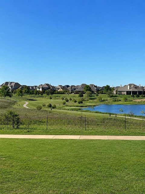 Photo of 824 Water Garden Circle, Little Elm, TX 75068 (MLS # 21350709)