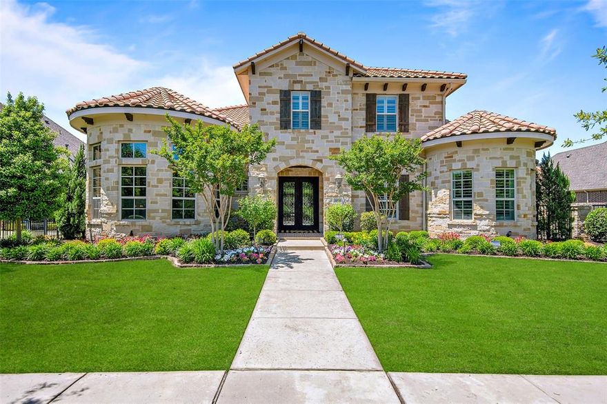 Premier Southlake location walking distance to upscale shopping, dining and exemplary schools. This stunning property is situated on a premium view lot, offering breathtaking lower and upper balcony views of greenbelts, a serene pond, and picturesque walking paths. Rare floor plan offers spacious living, large rooms, lots of storage. Expansive open living in great room and kitchen areas with retractable doors to outdoor living space, inviting infinity edge pool with attached spa and cozy fire pit. Main level includes an impressive primary suite, a guest suite situated for privacy with ensuite, executive office, media room. Dream laundry room with generous work area, pet wash and backpack drop zone. Upstairs game room with built-in wet bar and covered patio seating plus 3 additional bedrooms and 3 bathrooms. Upgrades include premium sound system throughout the house, 4 storage lifts in garages, third car garage has extended width work area, remote patio screens. Air filtration system.