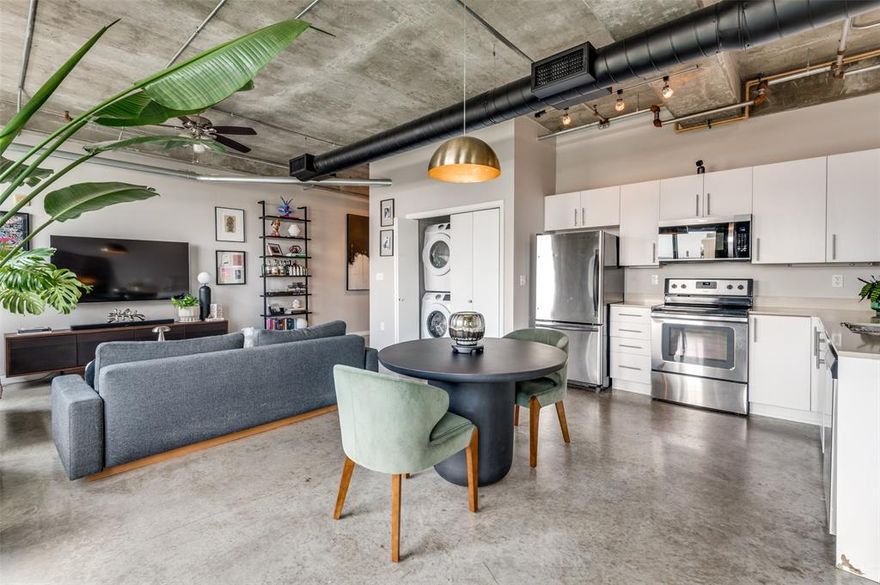 SELLER OFFER $5,000 CONCESSION TO BUYER FOR CLOSING COSTS OR RATE BUY-DOWN.  Experience true urban living at The Beat Lofts at Southside Station, a modern high-rise in the heart of The Cedars—Dallas’ most vibrant & eclectic neighborhood. This stylish 1Bed - 1Bath, sixth-floor loft combines industrial design with comfort and delivers sweeping south and east-facing views towards The Cedars and Fair Park. The open-concept floorplan is framed by walls of oversized windows, allowing natural light to pour in while highlighting the polished concrete floors, exposed ductwork, and soaring 10-foot ceilings. A large private balcony provides the perfect setting to enjoy Dallas’ sunrises & sunsets. The sleek kitchen features white cabinetry, quartz countertops, stainless steel appliances, a double-basin undermount sink, and a pull-down faucet. The spacious primary bedroom offers ample room to create a relaxing retreat, enhanced with blackout shades & a custom Elfa closet system. The sleek bathroom boasts an oversized shower finished in Carrara-pattern ceramic tile. Residents enjoy exclusive on-site features designed for relaxation, convenience, and community. The resort-style pool and spa showcase breathtaking views of the downtown Dallas skyline, while an outdoor gazebo, community grilling stations, firepit, and covered seating areas create inviting spaces to gather with friends or neighbors. A turfed greenspace offers room for outdoor activities, and pet owners will love the private dog run on the 1st level, and the adjacent neighborhood dog park, making life at The Beat as functional as it is fun. Just outside your front door, The Cedars neighborhood puts you steps away from some of Dallas’ most unique destinations. Within blocks, enjoy eclectic dining and entertainment at CANVAS Hotel, Gilley's, Alamo Drafthouse, Lee Harvey’s, Dive-In, Four Corners Brewing, Val’s Cheesecakes and much more.  For a quick commute or night out, DART Cedars Station is only a short walk away.
