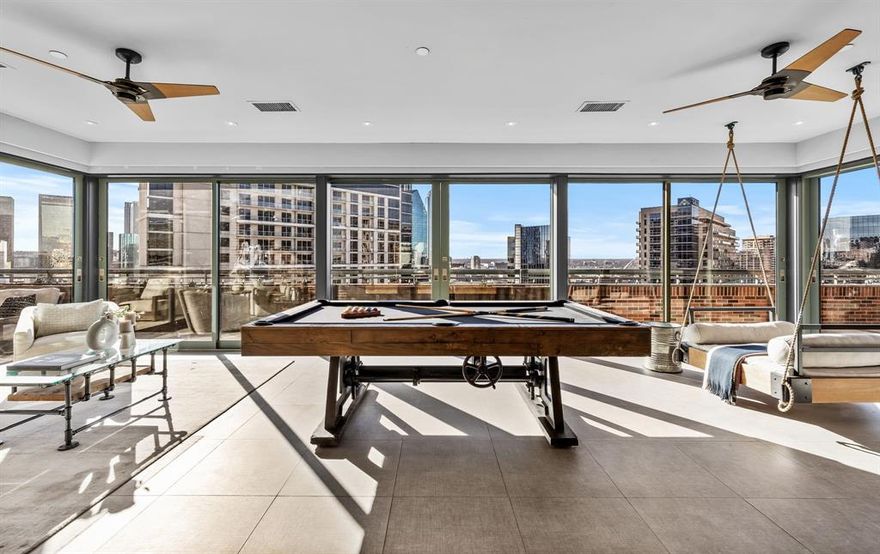 Experience urban luxury in this industrial-style PENTHOUSE loft at 1999 McKinney. With 2 beds and 2 baths, the corner unit boasts $500k+ in updates, ensuring a modern living experience. Enjoy almost 360-degree rooftop views of downtown and uptown Dallas. The wrap-around terrace offers 1500 sq ft of outdoor space, perfect for entertaining. The renovated kitchen features Wolf, Asko, and Subzero appliances, ideal for culinary enthusiasts. The loft space allows for an optional 3rd bedroom, adding flexibility. The primary suite is a retreat with oversized dimensions, complemented by a custom-painted brick wall. Indulge in new bathrooms, completing the contemporary feel. Meticulous attention to detail and high-end finishes make this industrial loft a rare find in Dallas. Embrace a dynamic urban lifestyle in a home seamlessly combining style, functionality, and panoramic views.