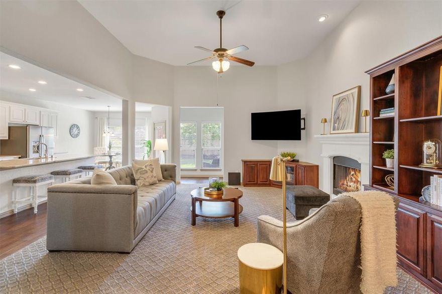 From the moment you walk through the grand front entry with its high ceilings and beautiful front door, you’ll feel the warmth and comfort of this inviting 3-bedroom home. It’s the perfect blend of everyday style, practicality, and an unbeatable walk-able location just minutes from both Cockrill Middle School and Boyd High School a rare advantage families will love!

The bright, open kitchen makes family life easy with granite counters, a gas cook-top, walk-in pantry, filtered water, and a large breakfast bar ideal for casual meals or after school snacks. The sunny dining area with a wall of windows sets the stage for morning breakfasts, homework sessions, and game nights. The spacious family room flows effortlessly from the kitchen and dining spaces, creating the true heart of the home. Built-in cabinetry and a custom entertainment center add both charm and functionality.

The split primary suite is a peaceful retreat with serene backyard views and a spa-like bath featuring a garden tub, dual sinks, separate shower, and a huge walk-in closet. Two additional bedrooms with Elfa closets are tucked up front perfect for kids, guests, or a home office. Step outside to a private, landscaped patio ideal for weekend cookouts or unwinding at the end of the day.

Recent updates include a full kitchen remodel (2022–2023), new carpet, lighting, and a whole-house water softener. Located on a quiet interior street with easy sidewalk access to both Cockrill and Boyd, plus nearby lakeside trails, parks, shopping, and dining this home offers the lifestyle your family has been looking for.

Homes with this level of walk-ability and comfort don’t come along often come see why it’s so special! (See Virtual Tour)