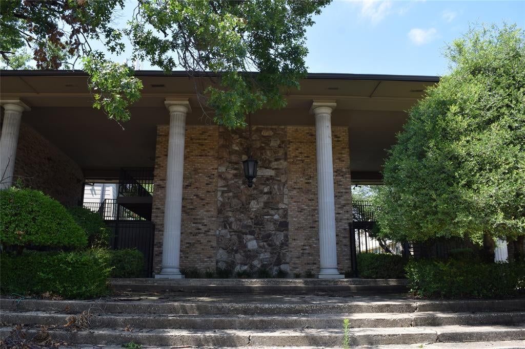 Photo of 7931 Royal Lane #216, Dallas, TX 75230 (MLS # 21385417)