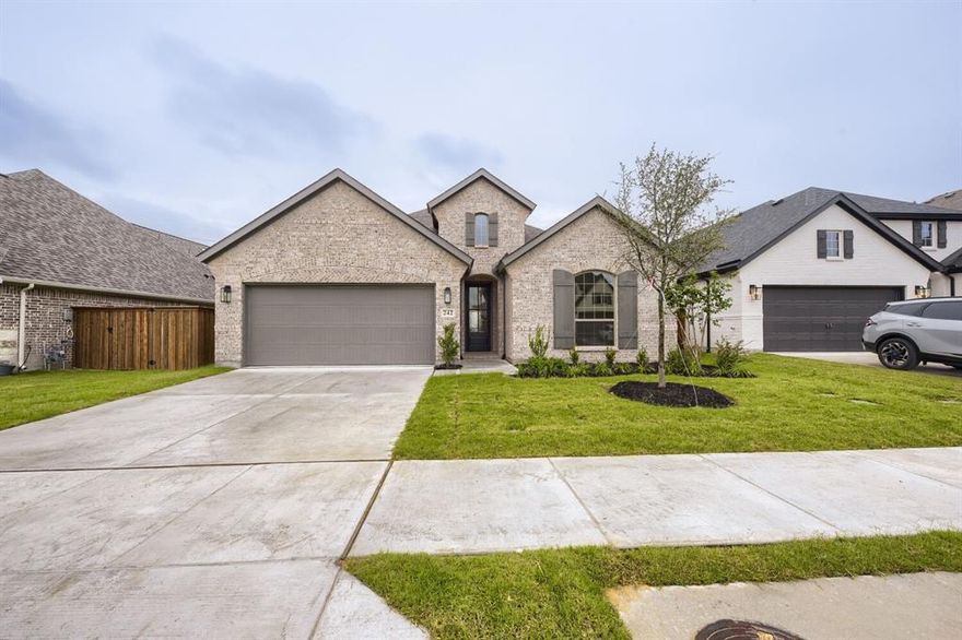 Welcome to a beautifully designed single-story home that blends comfort, thoughtful design and everyday functionality. This spacious floor plan offers three bedrooms, two full bathrooms and a dedicated study, creating the perfect balance of private retreat and shared living space. The secondary bedrooms are located near the front of the home with a nearby full bath, providing convenience and privacy for guests or family members. As you move through the home, the layout opens into a bright and inviting main living area. The kitchen serves as the heart of the home, featuring a large island, walk-in pantry and seamless flow into the dining and family room, perfect for both casual living and entertaining. Expansive windows allow natural light to pour into the family room, creating an open and airy atmosphere throughout the main living spaces. Just off the main living area, the private primary suite offers a relaxing retreat at the end of the day. The spa-inspired bath features dual vanities, a soaking tub and a spacious walk-in closet designed with plenty of storage and organization space. Thoughtful details and flexible spaces throughout the home make it ideal for modern lifestyles, whether you’re working from home, hosting friends or simply enjoying quiet evenings in comfort. Located in the desirable Reunion Neighborhood, this home is part of the award-winning Northwest ISD, complete with convenient bus transportation. With easy access to major freeways, Fort Worth and DFW Airport, this American Legend Home truly is a must-see!