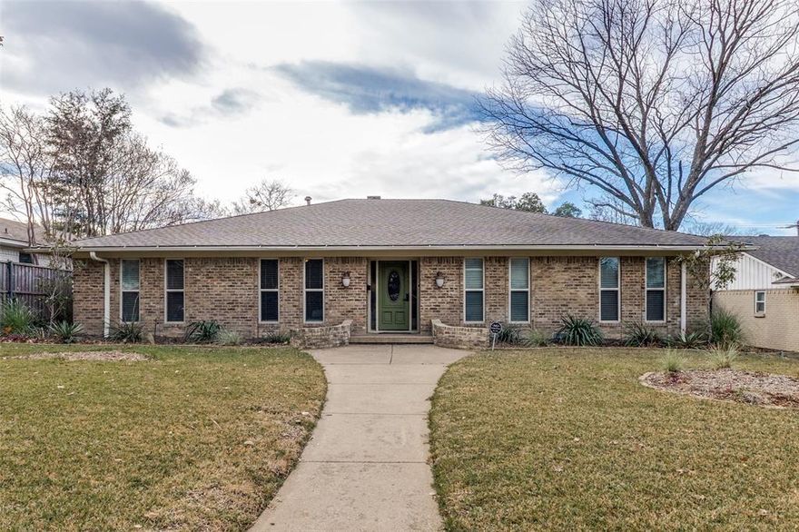 Open and spacious three-bedroom, 2.5-bath home with a two-car garage, located in the desirable Forest Meadow community and served by Richardson ISD. This light-filled property features beautiful hardwood floors throughout, crown molding, vaulted ceilings, and thoughtfully updated finishes. The remodeled kitchen offers granite countertops, stainless steel appliances, a gas cooktop, ample storage, and a charming, rounded dining area. Both bathrooms have been tastefully remodeled. The expansive primary suite includes a walk-in closet, while two large living areas provide flexible space for work or entertaining. Major improvements include a new HVAC system installed in 2023, premium blown-in fiber insulation added in 2023, and a hot water heater replaced in January 2026. Enjoy outdoor living with a lovely, covered patio, plus a beautiful pool and spa—perfect for relaxing or entertaining. A must-see home that blends comfort, style, and quality updates.