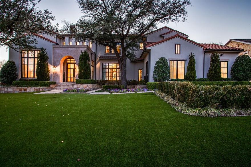 Nestled inside the gated Iris Hollow, this Mediterranean inspired estate's distinctive architectural touches include wood beam detailing, vaulted ceilings, expansive windows, and a spacious, open floor plan. Upgrades abound--from the designer lighting, quartzite waterfall island, and temperature controlled wine room, to the surround sound and smart home features--no detail was overlooked. The floor plan was thoughtfully designed and offers a primary suite and guest suite on both levels. The game room features a refreshment bar and media room which offer endless possibilities for in-home entertainment. The exterior amenities include a heated resort style pool, putting green, and an outdoor kitchen and bar, with a fully turfed yard. All of these can be enjoyed from the comfort of a four-season patio with a fireplace, built in commercial heaters, and surround sound. Whether entertaining or enjoying al fresco dining, the covered patio functions as an extension of the main living area.