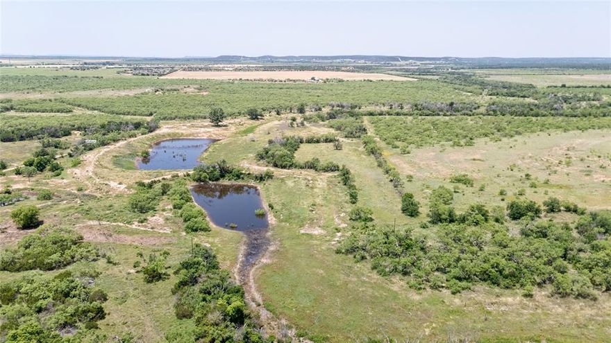 Live the Dream.  Just minutes from Abilene. This is some of the most gorgeous and tranquil land available. Multiple uses! Build your dream home! Electric and water are available. Hunt ranch or just use for a recreational getaway.  Open and wood areas.  All fenced. 1 Deer Blind is negotiable. 1 Large tank.  The home to the south located at 718 County Road 196 Is also available for an additional purchase situated on just over 28 acres. See MLS# 20567575. Buyer to verify All Information