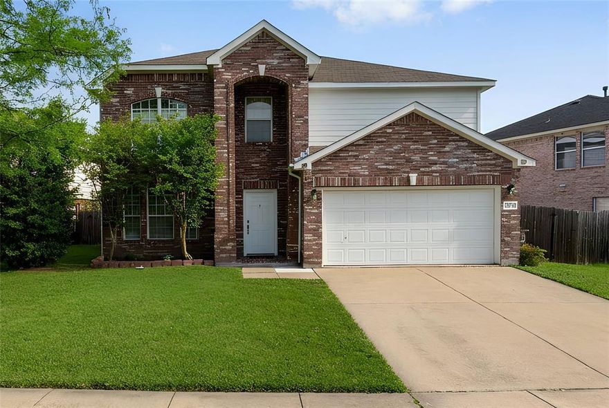Priced to sell! Welcome to this spacious two story brick home that features 5 bedrooms, 2.5 baths, 2 car garage, and a screened in porch! This lovely home features an open floorplan designed for everyday living and entertaining!  The main level offers two generous living areas, a dining area, laundry room, half bath and a bright eat in kitchen with new luxury vinyl plank flooring, a brand new Whirpool range and a brand new Frigidaire dishwasher! The layout creates an inviting atmosphere perfect for entertaining while still offering comfortable, functional family space! Upstairs, you will find all 5 bedrooms, thoughtfully separated from the main level.  A full bathroom and charming nook are shared spaces for everyone! The spacious primary suite features a huge walk in closet, and a relaxing bathroom with a separate shower and soaking tub! The other 4 bedrooms offer flexibility for family, guests or even work from home needs! Abundant closet space throughout ensures organization and efficiency!  Enjoy the outdoors in your big backyard and screened in porch where you can create another special place to relax and entertain! Keep the outdoor tools and toys handy in the storage shed that will stay! Conveniently located near 360, I-20, 287, and the airport, you will have options for your commute and easy access to all the shopping and dining you want! This home is located in the desirable Mansfield ISD, and has no HOA!  Whether you need room to grow, entertain or simply spread out, this home checks the boxes and is waiting for your personal touch!  Schedule your showing today before it is sold!