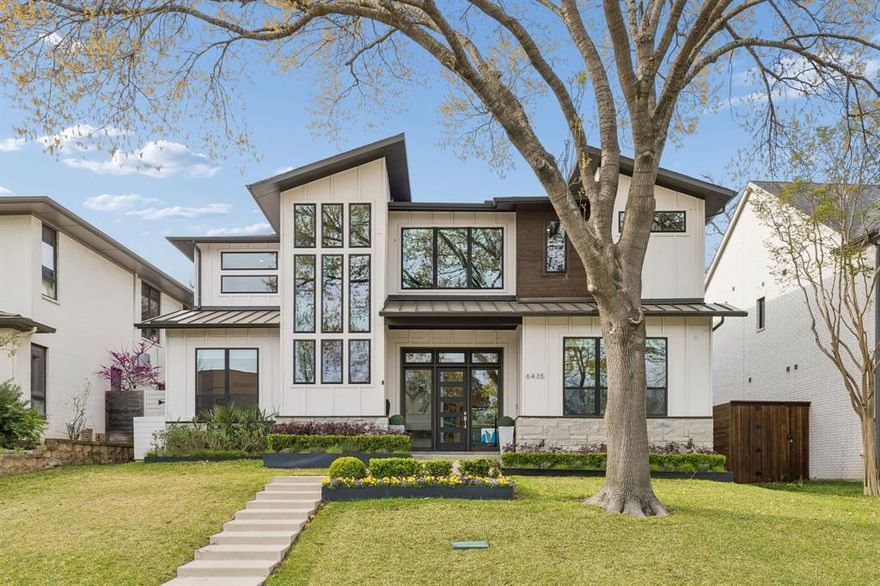 A 2019 built modern residence thoughtfully designed and constructed by Keen Homes, offering 4,111 square feet with 4 bedrooms and 4.5 bathrooms. The home showcases high-end craftsmanship, sleek contemporary finishes, and an efficient floor plan that supports both daily living and entertaining. Set on an elevated lot on the north side of the street, the property offers a strong sense of presence from the moment you arrive.
The main level features an expansive open-concept living-dining area anchored by a well-appointed kitchen with top-of-the-line appliances, ample cabinetry, and clean, modern styling. A signature feature is the 15-foot pocketing movable glass wall system, creating a seamless connection to the outdoor living space and enhancing natural light throughout the interior.
Outdoor amenities include a RBSandler pool with spa. Phantom screens add comfort and flexibility to the downstairs outdoor living space as well as the terrace off the upstairs primary suite. A turfed backyard provides a clean, green look with minimal maintenance. The main level also includes a private office and a downstairs ensuite bedroom, offering options for guests or multi-purpose use.
The primary suite is located upstairs and includes a fireplace, soaking tub, separate shower as well as an oversized walk-in closet. Two additional upstairs bedroom suites provide private baths and generous space.  A secondary living area upstairs includes a beverage center, creating a convenient lounge or media space. Additional highlights include a rear-entry garage with an electric car charger, mudroom and oversized pantry.
 Located in Lakewood near White Rock Lake, the property offers proximity to trails, parks, and neighborhood conveniences. Lakewood Elementary and Lakehill Prep are within walking distance. This is a rare opportunity to own a modern home with premium build quality, refined finishes, and exceptional indoor-outdoor flow.