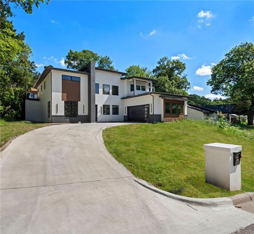 Experience elevated living in the heart of Dallas with this 4-bedroom, 3.5-bath custom home offering 3,467 square feet of refined design on a beautifully landscaped .20-acre lot. The first floor features a media room and office space (flexible as a fifth bedroom), two bedrooms sharing a Jack and Jill bathroom, and laundry room. Upstairs, the second-floor living area is designed for entertaining, featuring a living room with fireplace, dedicated dining area, and sliding glass doors to a covered patio. Another secondary bedroom with ensuite bath and walk-in closet is on the 2nd floor and perfect for guests. The gourmet kitchen with state-of-the-art stainless steel appliances, spacious walk-in pantry, gorgeous island and tons of natural light. The primary suite offers his and hers closets and a spa-inspired bath with separate tub and shower. Pre-wired for security cameras, cable, and WiFi, this home combines timeless craftsmanship with modern convenience. Don’t miss your chance to experience the flow of this stunning floorplan in person!