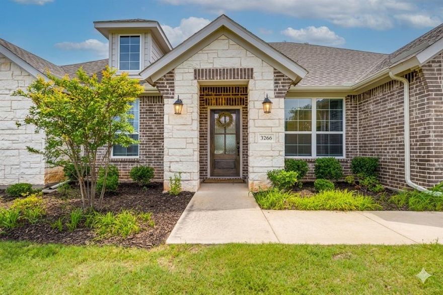 Nestled on a deep 1-acre lot, this meticulously maintained Salado plan, built in 2022 by Riverside Homes, FEELS BETTER THAN NEW! This rare offering perfectly balances sophisticated design with serene rural tranquility. The spacious layout showcases a split floor plan for privacy, offering a secluded Master retreat opposite the three secondary bedrooms.

This functional design includes a dedicated MUD area off the garage and a large laundry room (equipped with a utility sink) conveniently located between the MUD and the Master retreat. French doors open to a versatile Office-FLEX room—perfect for work, play, or hobbies.

Follow the welcoming entryway to the 'Heart of the Home,' a grand, sun-drenched space encompassing the Living Room, Kitchen, and Dining area. This area is adorned with a beautiful Austin-stone, wood-burning fireplace with a cedar mantle, a spacious kitchen island perfect for informal seating, and dining area giving you backyard views.

Step outside to experience those Texas sunsets from the covered patio, which comes already perfectly set up with ambient cafe lights and a ready-to-use outdoor TV setup. This 1-acre yard offers a vast, private canvas with limitless potential for a future pool, workshop, or simply wide-open peace and quiet. Don’t miss this opportunity.... Welcome Home!