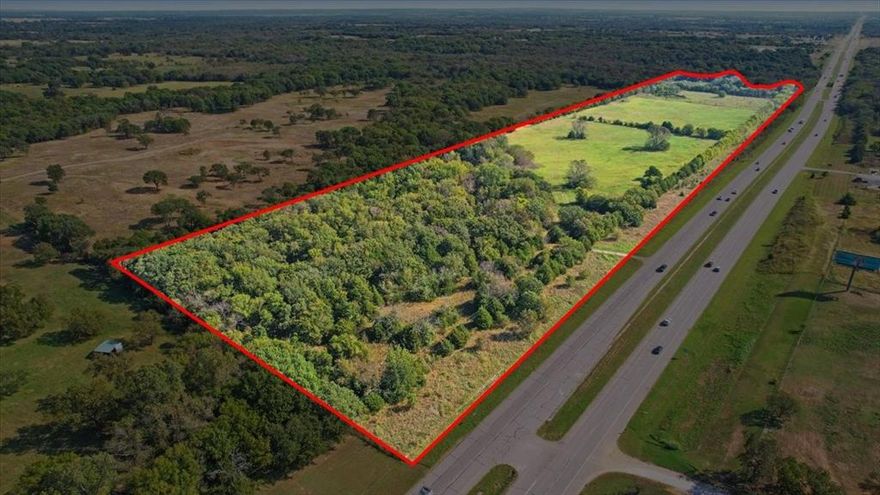 Presenting 48 MOL Acres of prime development or investment opportunity on U.S. Highway 82, Sherman, TX. Outstanding pathway to acquire approximately 48 acres of AG-exempt land with an impressive 3,560 feet of frontage on U.S. Highway 82, conveniently located about 12 west of Interstate 75 and downtown Sherman, Texas, at the Sadler exit. This unincorporated property, with No deed restrictions, lies roughly 5 miles west of the proposed Grayson County Tollway and North Dallas Tollway extension, offering exceptional potential for future growth and accessibility. Whether you plan to develop, invest and hold, or create your own family compound, the possibilities are wide open. Mid 20K Average Daily Traffic count. The land showcases a beautiful mix of open pasture and hardwood trees, along with a large tank and a metal barn with exterior stalls. Abundant wildlife including deer and hogs make it ideal for recreational or hunting use. Positioned in the Sherman IT corridor and convenient to Whitesboro, and Lake Texoma, this may be your perfect piece of Texas.  Utilities, no problem, there is a 6 inch water line servicing the adjacent property. New survey in hand. Information deemed reliable but Buyer should perform due diligence. Boundary lines are approximate.