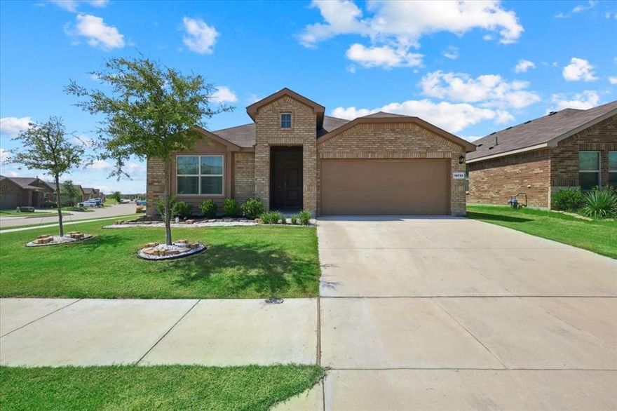 Discover this immaculate 2022-built home on a desirable corner lot in the highly sought-after Liberty Trails community. Nestled in top-rated Northwest ISD, this 4-bedroom, 2-bathroom home with a 2-car garage offers modern living with a well-designed floor plan on a 50-foot lot.

Within walking distance to the community pool, dog park, fishing pond, and playground, Liberty Trails offers the lifestyle you've been dreaming of—all with low HOA dues that won't stretch your budget.

Chef's Kitchen & Open Living: Step inside to be greeted by a chef's kitchen featuring white quartz countertops, white tile backsplash, gas cooking, stainless steel appliances, and a spacious pantry. The stunning upgraded quartz island with single-bin stainless sink and elegant gooseneck faucet. The kitchen, dining, and living areas flow seamlessly together.

Thoughtful Design Throughout: Tile flooring in the entry, kitchen, and wet areas ensures easy maintenance and timeless appeal. The family room overlooks your private corner lot—a generous fifth of an acre perfect for outdoor enjoyment.

Primary Suite Retreat: After a long day, unwind in your primary suite featuring a beautiful tiled shower with glass enclosure, quartz vanity, and walk-in closet. The split bedroom layout provides privacy, with secondary bedrooms offering easy access to the second bathroom.

Storage & Smart Features: Both bathrooms boast abundant storage with built-in linen shelves. The laundry room includes a dedicated plug for a second refrigerator or freezer. Modern convenience meets security with a touchscreen alarm panel connected to your video doorbell and smart door lock.

Prime Location: Easy access to Highway 114, I-35, and Highway 170 places you along the Alliance Corridor. Quick drives to airports, world-class shopping, restaurants, entertainment, and Roanoke—the unique dining capital of Texas.
This well-maintained home in a beautiful community won't last long. Schedule your private showing today!