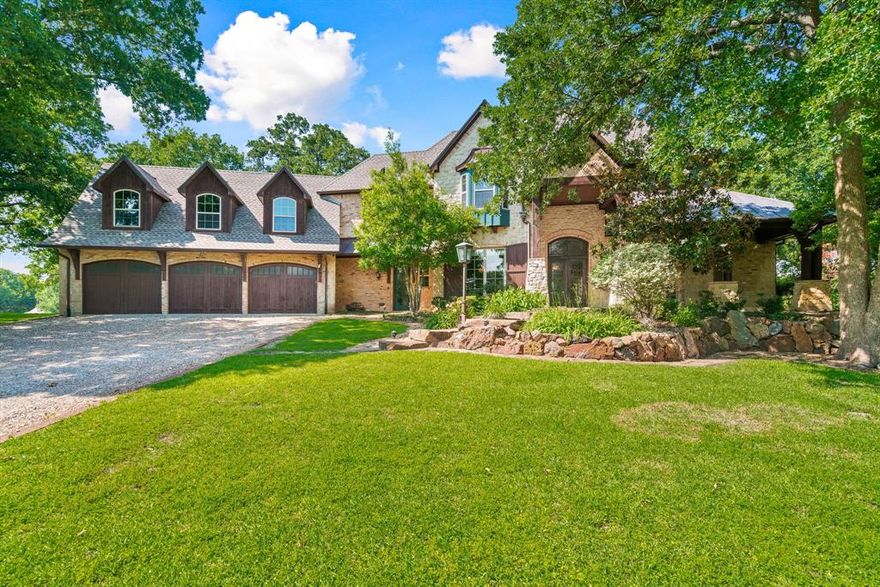 Excellent quality property! Private gated luxury ranch on 42 plus acres located less than 1 hour from Dallas. Gorgeous grounds and landscaping with a park like setting. Ideal family compound this property offers a luxury main house, tranquil saltwater pool with cabana outdoor living areas and a party barn with a full apartment. The home exhibits exquisite craftsmanship, with an expansive open floor plan that can accommodate large family gatherings. Light and bright design with beautiful panoramic views. Stunning interiors with hand scraped hardwood floors, high ceilings, crown molding, stone fireplaces, designer lighting and hardware. Chef’s kitchen with commercial appliances, gorgeous marble counter tops and ample storage. First floor primary suite has a fireplace and opens to outdoor living area overlooking grounds. Stocked ponds, sandy loam soil and majestic oak trees create the perfect ranch setting. Ideal family compound ranch, wedding venue or corporate retreat! Zoned ETJ!