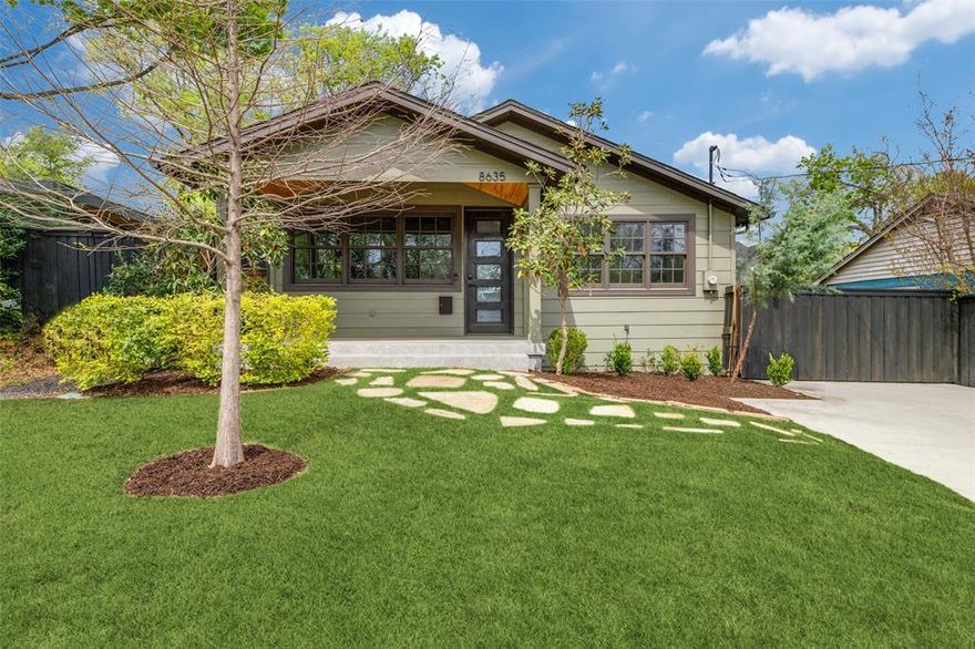 Fully remodeled charming bungalow located on a premier street in Little Forest Hills beautifully reimagined with designer finishes and thoughtful updates throughout. The inviting exterior, framed by mature trees and fresh landscaping, welcomes you to a covered front porch—perfect for morning coffee or relaxing evenings. Inside, you’ll find a light-filled open floorplan with vaulted ceilings and clean contemporary lines. The spacious living and dining areas flow seamlessly into the stunning kitchen, featuring a large island with barstool seating, updated countertops, custom flat-panel cabinetry, stainless steel appliances, and statement lighting that elevates the entire space. The private primary suite offers a serene retreat with spa-inspired finishes, while the secondary bedrooms are generously sized with ample natural light. Bathrooms are beautifully appointed with high-end materials, including striking porcelain tile, modern vanities, and glass-enclosed showers. Enjoy effortless indoor-outdoor living with sliding glass doors that open to a backyard deck and expansive yard. The oversized lot includes a detached four-car garage, additional parking space, sauna, and plenty of room for entertaining, gardening, or play. Blending modern style with everyday comfort, this move-in ready home offers exceptional design and functionality in every detail.