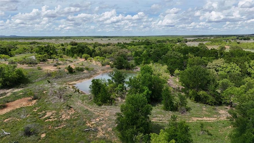 246 ± ACRES BROWN & COLEMAN CO. 
CATTLEMAN'S PARADISE
Located on the Brown and Coleman County line the opportunity for a turnkey investment starts now! This 246 acres is set up as a fine working ranch with good to excellent boundary and cross fencing throughout. The homestead has been a working cattle operation for the past 2 decades that has been meticulously managed to promote the regenerative growth of native pastures along with a well established hay field. Along with the native pastures you will find mature hardwoods scattered throughout along with some mesquite. The property boasts 2 stock tanks along with Muk Water Creek, a wet weather creek, that has deep pockets holding a substantial amount of water. As you make your way through this property you will find a good set of working-weaning pens conveniently located adjacent to the house.
The homestead features a 3-2 1804 Sq Ft home that has recent updates. The property has a unique feature, offering a domestic natural gas well, located on the property that supplies the home and land with endless options. With access to the domestic natural gas well the home has been outfitted with a backup generator system. The natural gas offers the option for an off grid home, while it currently runs the generator, appliances, and greenhouse.  The living space has an open concept kitchen and living area with granite countertops and a wood burning stove for those cozy winter days. The master bedroom is paired nicely with a large bathroom and convenient access to the laundry room. The other two bedrooms have adequate space. Adjoining the living area is a home office that allows for one to work remotely or have a space for your hobby room. The home has been thoughtfully updated with ADA accommodations from access, doorways, all the way to the pool. The pool which is located directly out the backdoor offers a relaxing place to soak up the long summer days on the ranch looking out on the expansive property. With the natural