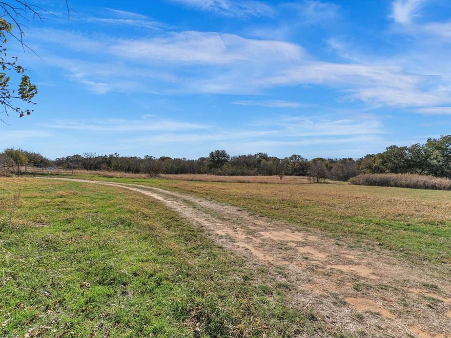 This ~13.78 acres located in Montague County between Bowie and Nocona is a rare find and is ready for you to BUILD!  Co-Op Electric, Well Water, a Conventional Septic System and RV Hookup sets this tract apart from others. With county road frontage on two sides, it is in a quiet rural setting with gently sloping land, a pond and scattered hardwoods. Ag exempt with open fields making it ideal for livestock. Being centrally located between Bowie and Nocona, you are ~15 minutes from either town for your convenience while feeling like your future homestead is away from the congestion of the city. There is no known floodplain making this tract feasible for your multi-generational living arrangement. Come see this slice of TX today!