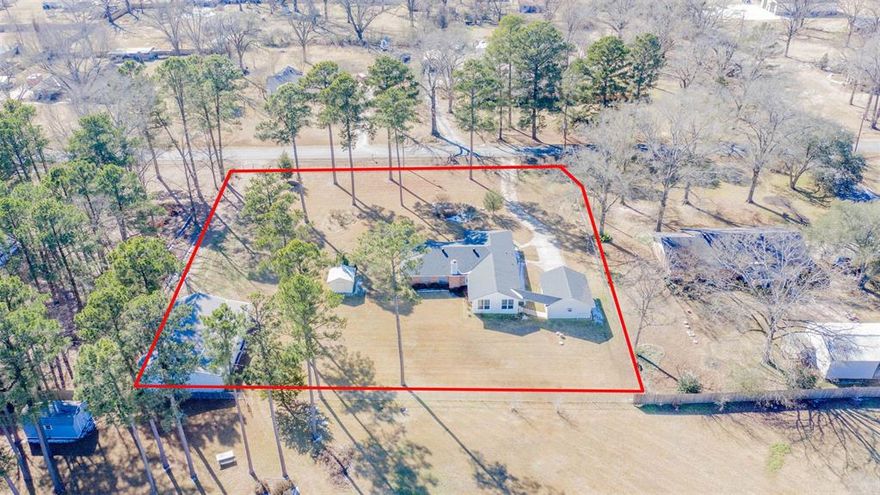 BENTON HOME ON ACREAGE WITH A SHOP FOR SALE!!! This classic traditional brick home sits on TWO lots totaling 1.14 acres! Upon entering the wrought-iron gated driveway, you are greeted with a BEAUTIFUL and well-maintained home with a detached two car garage that includes a separate washer and dryer hookup and could be completed and used as a mother-in-law suite! The 2,290 square foot home encompasses space upon space! There are TWO living spaces, one with a fireplace that can burn gas logs or be wood burning, whichever you prefer! The kitchen and dining spaces are perfect for entertaining, as they are open. The primary bedroom and bathroom are LARGE!!! They don't make them like this anymore! And just beyond the primary bedroom is ANOTHER (third) living space that could be a private extension of the primary bedroom, a room for entertainment, or whatever your hobbies consist of! The HUGE shop to the right of the home offers tremendous storage or room for projects! Schedule to see this home TODAY!!!