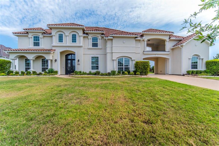 Don't miss out! 5588 sq ft luxury Toll Bros home in the Beautiful Townlake subdivision. Welcome your guests in, through elegant double wrought iron doors to a grand 2 story foyer with a sweeping wrought iron staircase. The open living space showcases a stunning floor to ceiling fireplace and gourmet kitchen with oversized island, quartz counters, double ovens, built-in beverage refrigerator and a 6 burner gas cooktop. The downstairs main retreat boasts a spacious bedroom, luxurious bath and enormous dream closet. Top the stairs to a generous flex space along with 3 bedrooms, 2 full baths and a media room, attached to a charming balcony patio. Included amenities: second staircase, upgraded tile roof, plantation shutters and designer lighting. Make this your own!