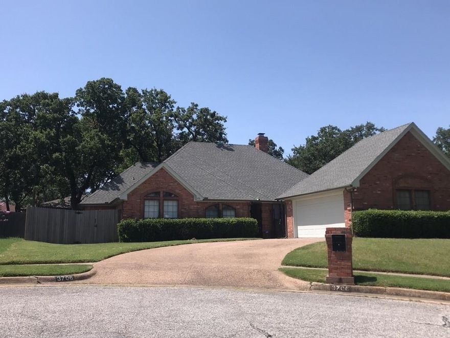 You'll love this Arlington home and is nestled in the mature Indian Wells neighborhood! Completely remodeled...Highlights include beautiful crown molding, tray ceilings, a brick wood-burning fireplace, large windows in each room providing tons of natural light, an ample amount of cabinet space in the kitchen, a garden tub and separate walk-in shower in the master bathroom, a covered patio, granite countertops, vinyl plank flooring, and so much more! The Master bedroom offers a separate door to the backyard covered patio.  Dry bar in living area.  Kitchen has cathedral ceiling and includes lots of cabinet space.  Laundry room has cabinets and full size washer & dryer area and a sorting room.  Eat in area has built in shelves.  Home is also located within close proximity to several parks, shopping and restaurants. Don't miss out on this must-see home! Set up your appointment today!