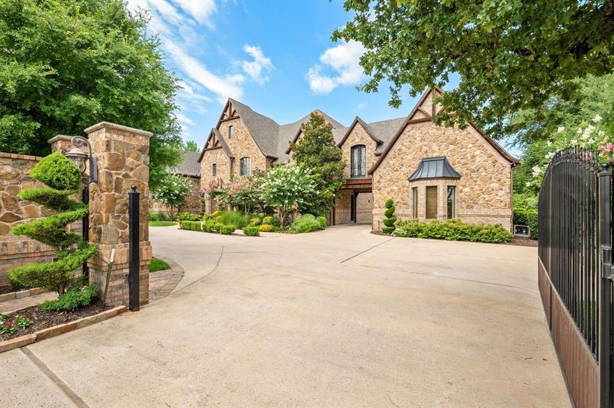 Secluded behind the gates on nearly an acre in the prestigious Southlake community, this extraordinary estate offers unmatched luxury, privacy, and sophisticated updates with high-end finishes throughout. Designed for both comfort and grand-scale entertaining, the home features an open floor plan that effortlessly integrates indoor and outdoor living.

With five spacious bedrooms and seven elegantly appointed bathrooms, this home provides ample space for both family living and entertaining. The expansive gourmet kitchen flows seamlessly into the sunlit family room, where walls of windows frame picturesque views of the lush backyard oasis.

Entertainment is at the heart of this home, with a dedicated media room, game room, and a sprawling back patio designed for year-round outdoor enjoyment. The patio is equipped with drop-down screens, offering the perfect setting for relaxation in any season.

Whether hosting an elaborate event or enjoying quiet family moments, this meticulously updated estate blends elegance, functionality, and an unbeatable location, creating the ultimate Southlake retreat for those who value luxury living. This estate is not just a home—it’s a lifestyle.