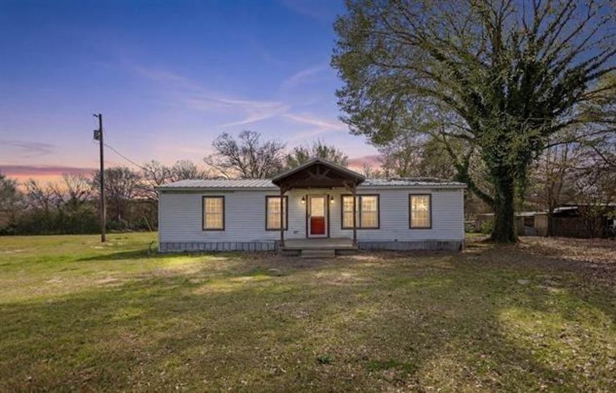 **Your Slice of East Texas Paradise Awaits** Welcome to over two acres of wide-open possibility nestled in the highly sought after Lindale Independent School District! This charming three bedroom, two bathroom mobile home sits on a generous 2.33 acre spread, offering the kind of breathing room that city dwellers only dream about. While the home is ready for a little love and creative vision, the real showstopper is the fabulous shop built in 2019. This impressive 24x30 workspace comes complete with a 24x25 carport, perfect for the hobbyist, mechanic, or weekend warrior who needs serious room to tinker and create. The property enjoys convenient access to Lindale High School, keeping your family connected to excellent education without the long commute. Whether you envision revitalizing the existing home or building your forever dreamhouse on this beautiful acreage, the potential here is truly limitless. Do not let this rare opportunity slip through your fingers schedule your private showing today!