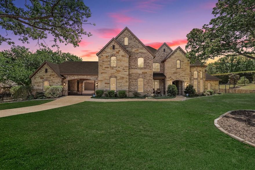 Tucked within the prestigious gated community of Montalcino Estates, this extraordinary estate offers a rare blend of architectural sophistication, functional luxury, and resort-style living—all set on a serene, park-like 1+ acre homesite within the highly sought-after Argyle ISD.
Designed for both grand entertaining and effortless daily living, this 6-bedroom, 7-bathroom residence delivers an exceptional floor plan complemented by high-end finishes, expansive gathering spaces, and refined design details throughout. You’re welcomed by soaring ceilings, natural light, and a sense of scale that feels both impressive and inviting.
At the heart of the home, the chef’s kitchen seamlessly connects to multiple living and dining areas, creating a natural flow ideal for hosting intimate dinners or large-scale gatherings. Thoughtfully designed for convenience and accessibility, a private elevator allows effortless navigation between levels—perfect for multi-generational living or executive lifestyles.
The home’s luxury amenities elevate everyday living into an experience. A dedicated wine room showcases curated collections, while a fully equipped home gym supports wellness without leaving the comfort of home. Each bedroom offers its own private retreat, with en-suite baths designed to reflect spa-like tranquility.
Step outside to discover a true backyard sanctuary. The expansive outdoor living space features a stunning resort-style pool, surrounded by mature landscaping that creates privacy and a peaceful, estate-like atmosphere. 
A spacious 4-car garage offers ample room for vehicles, storage, or hobby space—ideal for collectors or active families.
Located in one of the most desirable luxury communities in Flower Mound, residents enjoy gated privacy, scenic surroundings, and convenient access to DFW’s top destinations—all while benefiting from the excellence of Argyle schools.
This is more than a home—it’s a lifestyle defined by space, privacy, and elevated living.