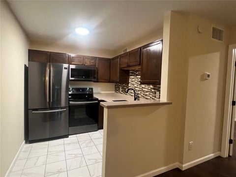 Photo of 18333 Roehampton Drive #417, Dallas, TX 75252 (MLS # 21408946)