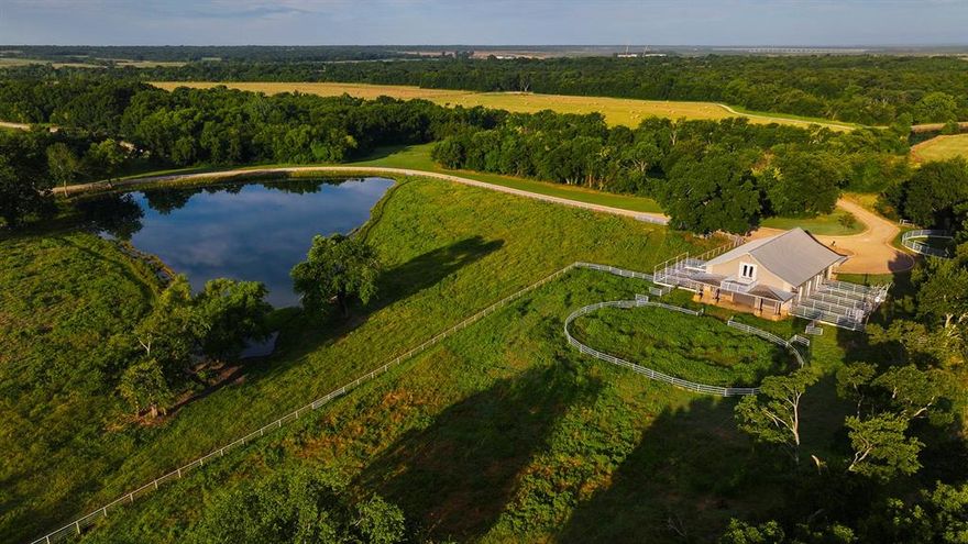 A justifiably improved 263± acre ranch two miles from the newly constructed 16,000-acre Ralph Hall Lake. Developed with an upgraded equestrian facility, remodeled cottage, event barn, hay production, and two-acre pond.