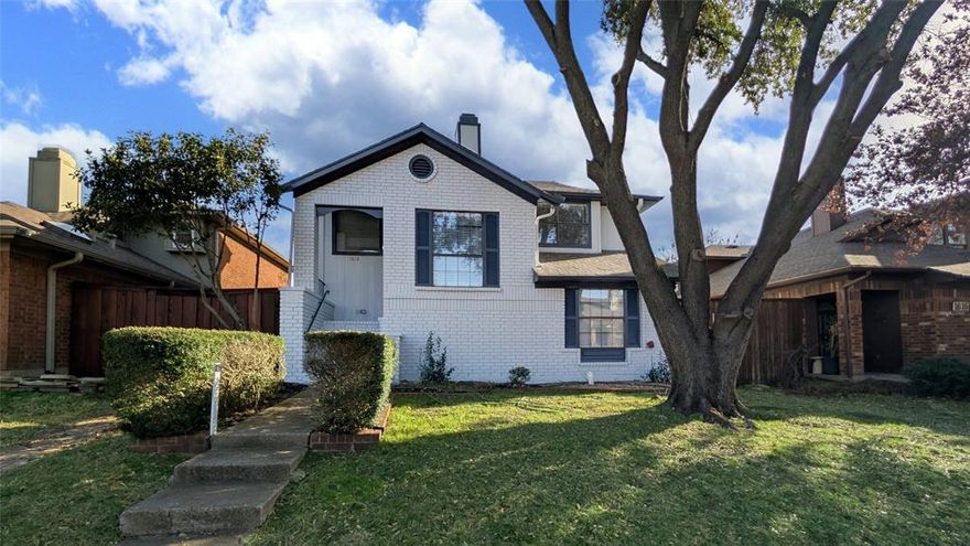 This charming 3-bedroom, 2-bathroom home, centrally located in highly sought-after North Carrollton, TX, is the perfect place to call home. The home was meticulously updated in 2026 with fresh paint inside and out, and two brand-new air conditioning units installed in January 2026, each with a 10-year warranty. A welcoming foyer is equipped with a designer chandelier. New laminate flooring has been installed on both levels, along with new plush carpet in the primary bedroom. The kitchen has been upgraded with quartz countertops, a breakfast bar, an abundance of recessed and under-cabinet lighting, designer chandeliers, and stainless steel appliances. The primary bedroom features its own fully renovated bathroom with a double vanity, a standing shower with a frameless glass door, designer tile, modern color-changing faucets, and a huge walk-in closet. The home offers two spacious living rooms, one with a stone fireplace, an elegant ceiling fan on a vaulted ceiling, and recessed lighting—providing plenty of room to relax and entertain guests. The dining room is decorated with an elegant chandelier and skylight. Secondary bedrooms are situated downstairs along with a second living room, a full bathroom, and a laundry area. A two-car attached rear garage and two carports provide ample parking, with abundant cabinetry in the garage for hobby enthusiasts. This home is located in a quiet neighborhood and is surrounded by three major highways for easy access to all routes. Don’t miss this opportunity to own this wonderful home. Schedule your showing today!