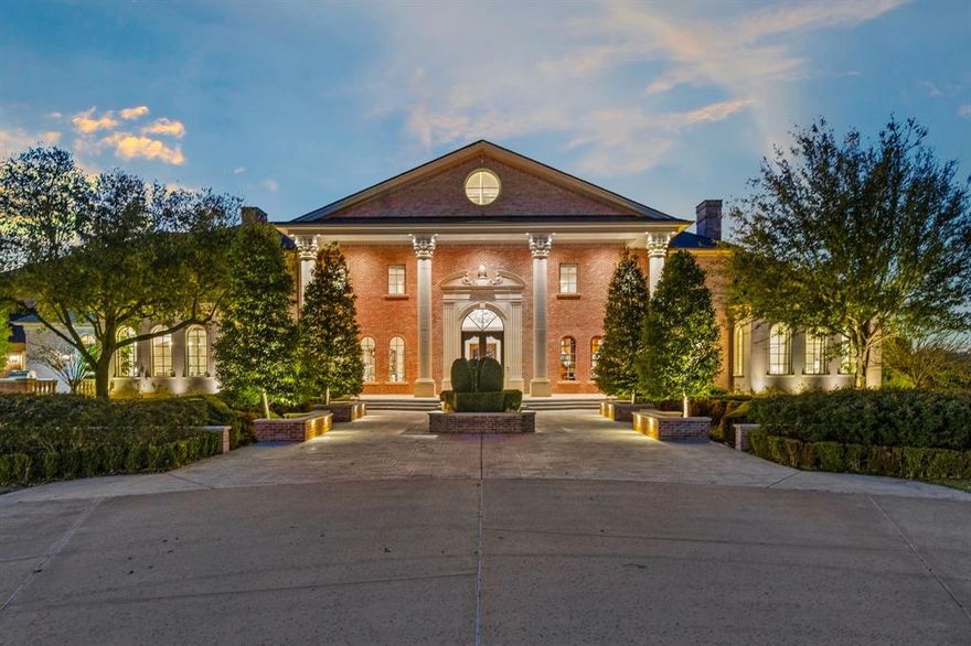 702 S White Chapel Blvd is an architectural masterpiece providing elegance and privacy, set behind gates on nearly 4.2 pristine acres along one of Southlake’s most coveted roads. Enjoy the drive in as it reveals a stocked pond, fountain, gazebo, and meticulously curated landscaping, making it an unforgettable arrival to this Paul Kramer–designed estate offering approximately 14,528 square feet of living. The estate features six private bedroom suites, each with its own ensuite bath, along with ten bathrooms. A separate guest apartment offers accommodations for visitors or staff. Inside, a grand two-story foyer opens to an intimate floor plan designed for both sophisticated entertaining and effortless daily living. Highlights include a chef-caliber kitchen with multiple living and dining spaces, two executive studies, four custom fireplaces, a climate-controlled wine cellar and a 14-seat private theater. The primary suite is a sanctuary unto itself, complete with a private sitting area, spa-inspired bath, and expansive dual closets. An elevator ensures seamless access to all levels, including 1,000 sq feet of storage space. Upstairs, two guest suites open to a full-length covered balcony with sweeping views of the grounds. Outdoors, the estate rivals a private resort—featuring a heated and chilled gunite pool and spa with illuminated water features, fire bowls, sun shelves, cabana, and covered pavilion with integrated media. Three distinct covered patios include a fully screened all-season living space with a dramatic dual-sided fireplace, an open-air garden patio, and additional outdoor lounges ideal for year-round entertaining.  A secondary leveled backyard offers limitless possibilities for recreation, gardens, or curated outdoor pursuits. Enhanced by advanced security, smart-home technology, and located within award-winning Carroll ISD, this extraordinary estate delivers unparalleled luxury, privacy, and prestige.