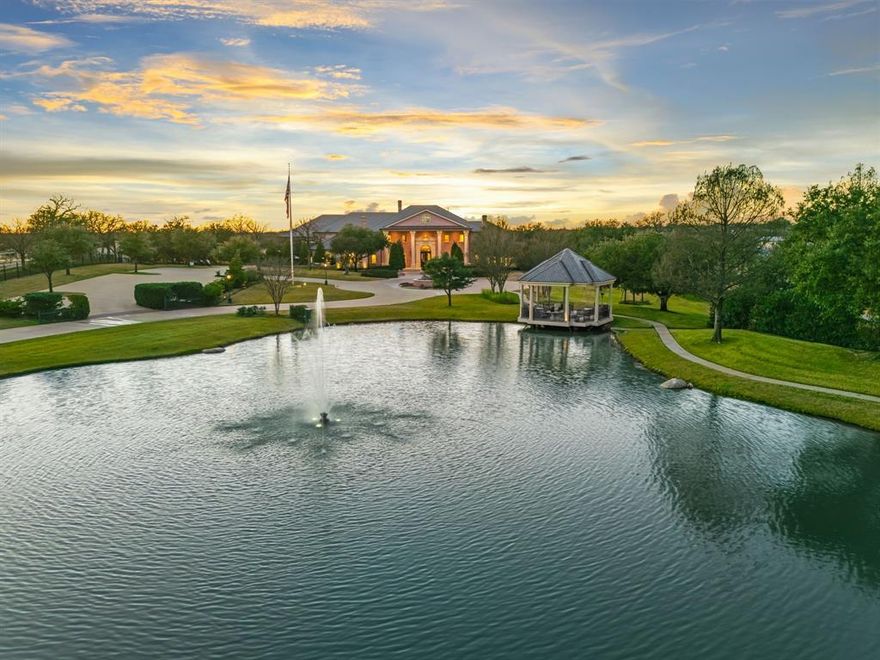702 S White Chapel Blvd is an architectural masterpiece providing elegance and privacy, set behind gates on nearly 4.2 pristine acres along one of Southlake’s most coveted roads. Enjoy the drive in as it reveals a stocked pond, fountain, gazebo, and meticulously curated landscaping, making it an unforgettable arrival to this Paul Kramer–designed estate offering approximately 14,528 square feet of living. The estate features six private bedroom suites, each with its own ensuite bath, along with ten bathrooms. A separate guest apartment offers accommodations for visitors or staff. Inside, a grand two-story foyer opens to an intimate floor plan designed for both sophisticated entertaining and effortless daily living. Highlights include a chef-caliber kitchen with multiple living and dining spaces, two executive studies, four custom fireplaces, a climate-controlled wine cellar and a 14-seat private theater. The primary suite is a sanctuary unto itself, complete with a private sitting area, spa-inspired bath, and expansive dual closets. An elevator ensures seamless access to all levels, including 1,000 sq feet of storage space. Upstairs, two guest suites open to a full-length covered balcony with sweeping views of the grounds. Outdoors, the estate rivals a private resort—featuring a heated and chilled gunite pool and spa with illuminated water features, fire bowls, sun shelves, cabana, and covered pavilion with integrated media. Three distinct covered patios include a fully screened all-season living space with a dramatic dual-sided fireplace, an open-air garden patio, and additional outdoor lounges ideal for year-round entertaining.  A secondary leveled backyard offers limitless possibilities for recreation, gardens, or curated outdoor pursuits. Enhanced by advanced security, smart-home technology, and located within award-winning Carroll ISD, this extraordinary estate delivers unparalleled luxury, privacy, and prestige.