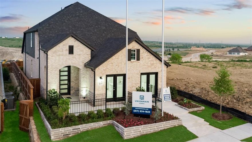 MODEL HOME FOR SALE with $106,266 in Upgrades including additional full bath, extended patio, and tray ceiling in the entryway! Gorgeous UnionMain Homes with designer upgrades and finishes inside and out with lush, professional landscaping in both the front and back yard. 4 bedrooms, 3 and a half baths, living room, dining room, office, loft, fireplace, covered back patio, and 2 car garage. The first floor showcases a spacious family room with vinyl floors that flows into the dining area and a modern kitchen. The living space invites you to linger with its beautifully appointed shiplap fireplace rising dramatically to the ceiling, framed by curated designer light fixtures that add warmth and character. The kitchen is a true showstopper featuring quartz countertops, GE Stainless Steel appliances with gas stovetop, classic shaker cabinetry with 42-inch upper cabinets, designer tile backsplash, large island, and walk-in pantry. The primary suite features a luxurious bath with Venetian Marble and generous walk-in closet, while an office at the front of the home provides a flexible space for work or quiet time. Upstairs, a large loft with linen closet anchors three additional bedrooms, each with walk-in closets, along with two full baths. Other great features are Kwikset Smart Code front door, WIFI programable thermostat, raised 8-foot doors, full sprinkler system, 6' board-on-board with cap fence, 16 SEER AC, Zurn PEX plumbing, Rheem tankless water heater, 30 year Dimensional Driftwood shingles, Vinyl Low E windows, window treatments, and mudroom. The HOA features a swimming pool, playground, and hiking & biking trails. Property will be available for move-in 30 days from contract date.