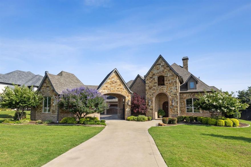 Beautifully updated custom home in the prestigious gated community of Greenspoint that has an open concept kitchen & living rm with vaulted ceilings, stunning wood beams & new light fixtures. Updated kitchen with painted cabinetry, quartz counters, designer backsplash, dual dishwashers & ice maker in the massive pantry. An oversized formal dining rm & butler’s pantry make for the ultimate indoor entertaining. The primary boasts a built-in fridge & coffee bar, 2-sided fireplace, sitting area & ensuite with freestanding tub, heated floors, oversized shower, 3 vanities & a custom closet system. Huge game room with ice maker & wine fridge. Enjoy beautiful views of the wooded creek & pond in the distance while you bask in the cascading infinity pool. Resort like outdoor living with a fireplace, TV & a kitchen with fridge, sink & grill. Enjoy the greenhouse for year-round fresh flowers & vegetables. This home sets the standard for elegant living with impeccable quality and a timeless design!