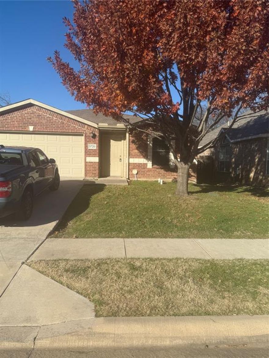 This 4 bedroom  home offers curb appeal, smart use of space, and a location within a planned community with neighborhood pool! Kitchen features contemporary cherry-tone cabinets, black appliances including stove with vent hood, and breakfast peninsula. Living room, dining room, and bathrooms are elevated by oak-colored laminate floors. Master bedroom has private bathroom with combination tub and shower. Side entrance opens to croquet-ready back lawn.   Both bathrooms have 2 vanities.    Fresh paint.   This is perfect for a family.