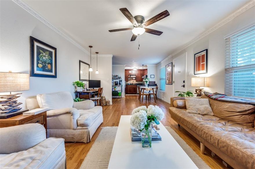 Quaint corner unit with pool view. This two bed, two bath condo boasts hardwood flooring and two full bathrooms that were refreshed in 2022. Pet friendly community with walkability to SMU, Central Market, 24 Hour Fitness, Milo's and Parkit Market! Built-in wine fridge in the kitchen offers a sleek upgrade to the updated kitchen. Refrigerator, washer and dryer come with the unit.