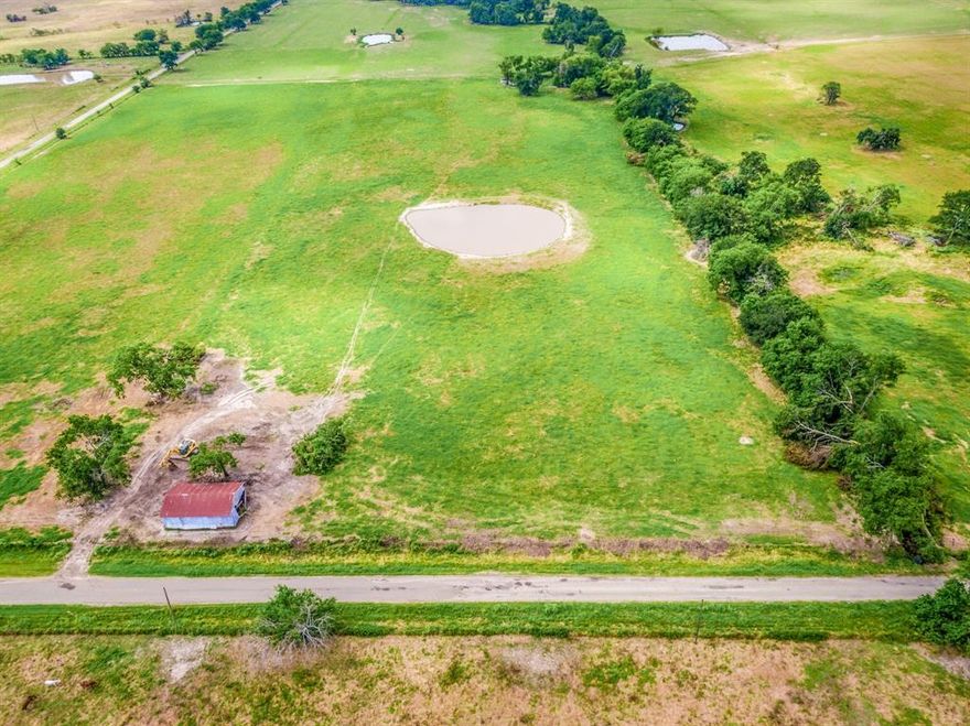 Discover the ideal location for your dream home on this 3+ acre lot with a pond! This plat-approved, cleared, and ready-to-build land offers limitless possibilities with no restrictions. Build a tiny house, barndo, mobile home, or a traditional house to suit your needs. Experience the tranquil country atmosphere surrounded by scenic farmland while enjoying a paved road and convenient access to shopping, restaurants, and entertainment in Sulphur Springs. This prime spot is just a quick 6-minute drive to Cooper Lake State Park South, perfect for water activities, camping, and relaxation. Located only an hour from Rockwall and just 30 minutes from Commerce or Greenville, commuting to work is a breeze. Enjoy the perfect blend of peaceful country living and modern conveniences within reach. The barn has now been removed. Owner Financing available! Seller will finance - call for details.