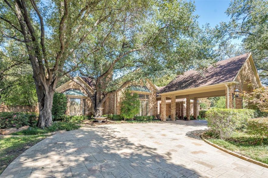 An exquisite 1.5 story home on heavily treed cul de sac lot. Beautiful covered front entry, hand scraped floors, high ceilings & timeless moldings.  Perfect for entertaining with the large living spaces and tasteful dining room. Enjoy the kitchen with large granite island, 6 burner flat cooktop, double ovens, warming drawer & breakfast bar. All bedrooms down. 5th bedroom could be an exercise room with dry sauna. Master with separate baths, steam shower and hydrotub. Upstairs takes you to a large media & game room with a sunken den.  The backyard is a highlight of the home.  A spacious yard with a covered patio, built in grill, stone fireplace, pool with a hot tub and a mosquito misting system to keep you comfortable.