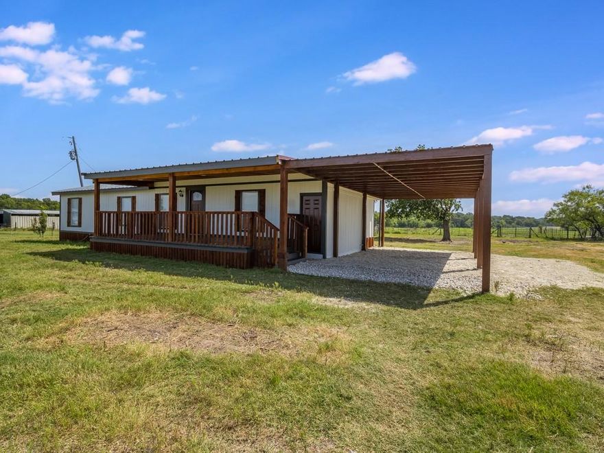 TURNKEY COUNTRY RETREAT—JUST LISTED in Groesbeck!
This beautifully updated 4-bedroom, 2-bath home sits on just under 14 UNRESTRICTED acres with everything you’ve been looking for—POND, BARN, perimeter fencing, and a gated entrance!

Inside, the home has been fully renovated from the studs to the rafters—brand new metal roof, HVAC, plumbing, electrical, tape & texture, paint, floors, countertops, lighting, fixtures—you name it, it’s NEW. Enjoy the covered front porch, oversized carport, and open layout perfect for entertaining or relaxing after a day on the land.

Hunters and hobby farmers, take note: you can hunt your own land, raise animals, or finally start that mini-farm dream. The livestock barn is ready for your tools or livestock.

Conveniently located just 6 minutes from town on a county-maintained paved road, you’ll enjoy both peace and privacy without giving up quick access to dining, groceries, and schools. Located in highly sought-after Groesbeck ISD, only 6 minutes from the elementary and 8 minutes from the high school.

Easy commute and central location in the middle of the “Texas Triangle” to:
• Waco – 35 min
• College Station – 1.5 hrs
• Dallas – 1.5 hrs
  Austin - 2 hrs
• Houston – 2.5 hrs

This one checks ALL the boxes and then some—don’t wait!