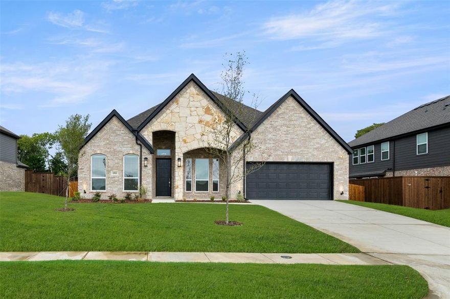MLS# 21047239 - Built by First Texas Homes - Ready Now! ~ Nestled on a spacious 82ft wide lot, this luxurious 2.5 car garage home combines style and convenience. Enter through the extended front porch with brick-stone elevation into 12' ceilings with a private bedroom with a ensuite bath. A grand study with double doors invites you whether you're hybriding or permanent from home. The huge gourmet kitchen, centered around a California island, offers tons of cabinetry and a walk-in pantry. Sliding doors are your escape the spacious backyard that backs up to farmland. The primary suite features a spa-like bath with an oversized shower and massive walk-in closet elongated vanity. Thoughtful additions include home automation, a powder bath, and a sprinkler system, guttered for easy maintenance.