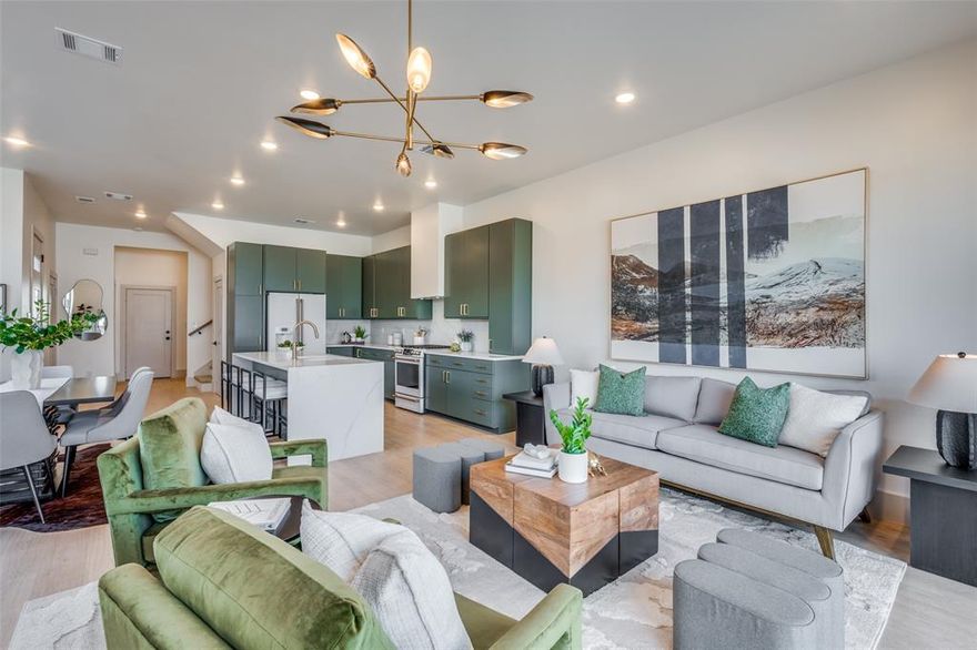 This stunning new construction townhouse in the highly desirable Dickies Arena area offers the perfect blend of modern luxury and unbeatable location in Fort Worth. Featuring 3 bedrooms and 2.5 bathrooms, this home boasts high-end finishes throughout, including sleek green tiled primary bath with a freestanding white soaking tub, seamless glass shower, dual vanities, and elegant gold fixtures; a gourmet kitchen with sage green cabinetry, expansive marble-look island, premium appliances, and seamless flow into the open-concept living and dining areas. The light-filled interiors showcase contemporary design with neutral tones, chic lighting, and large windows that invite natural light and connect seamlessly to outdoor spaces.

Step outside to your private amazing rooftop patio with breathtaking panoramic views of Dickies Arena right next door and the iconic Fort Worth downtown skyline—ideal for entertaining, morning coffee, or watching events and city lights. Additional highlights include a two-car garage, low-maintenance living, and prime proximity to the energy of Dickies Arena, cultural venues, dining, and easy access to major thoroughfares. Don't miss this rare opportunity to own a brand-new, turnkey townhome in one of Fort Worth's most exciting neighborhoods—perfect for those seeking style, convenience, and spectacular vistas!