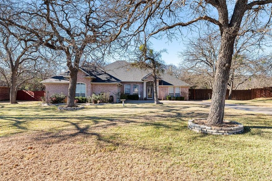If you are looking for a great property in a quiet neighborhood with quick access to shopping, schools and the Metroplex, this beauty in Acton is calling your name! Nice 3-2-2 custom-built home on cul-de-sac has fantastic curb appeal. Functional floor plan. A pretty wood burning fireplace flanked by built-in shelves and cabinets is the focal point of the living room. Kitchen is equipped with handsome cabinets, lots of countertop space, a handy island, roomy pantry and breakfast nook. Split bedrooms. 19 x 13 primary bedroom has trayed ceilings and offers ample space for large furniture and access to covered patio. En suite is also spacious and boasts a big walk-in closet. Guest wing features a Jack and Jill bathroom accessible to both bedrooms and the hall. Abundant storage throughout. Sprinklers. Formal dining room can also be used as an office. Very private, fenced back yard. Expansive driveway with room for additional parking. At this price, you can afford to do some additional updates or customize the home to your taste. You can't beat the location. Schedule your private showing today!