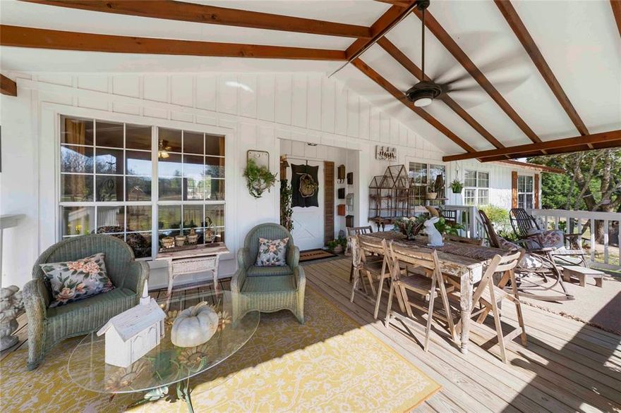 Don’t miss this charming country retreat at 8235 County Road 506, Anna, TX 75409. This beautifully renovated 3-bedroom, 2-bathroom home sits on nearly 2 serene acres with large, well-groomed trees, a gently sloping yard, and a seasonal creek that flows most of the year. Located on a quiet road with only three homes, it offers privacy, peace, and a true sense of rural Texas living—just minutes from town. Inside, the home features spacious open-concept living areas with cedar-wrapped beams, recessed lighting, and stylish finishes. Recent upgrades include a Rheem tankless water heater (2023), Ecobee smart thermostat, LED lighting, and Halo air purification system. The kitchen includes stainless Whirlpool appliances with an infrared cooktop. A generous laundry room offers excellent storage, while the 2022 HVAC system and new ProFlo aerobic septic system add modern convenience. Enjoy a large, covered front porch with an energy-efficient ceiling fan—perfect for outdoor dining. The backyard features a stock tank pool, flower beds, and a spacious deck for entertaining. A 3-bay carport includes a large storage closet and custom cabinets. The property also offers a 20' shipping container and a deluxe 12x16 “She-Shed” fully insulated, heated-cooled, and wired, with double-pane windows. Additional upgrades include a red galvanized steel roof (2020), grooved siding with battens, and brick skirting around the foundation. The hogwire-fenced dog run provides a safe play area for pets. With over $160K in improvements, this is a rare opportunity to own a move-in ready home that blends rustic charm with modern comforts in a quiet, star-filled country setting.