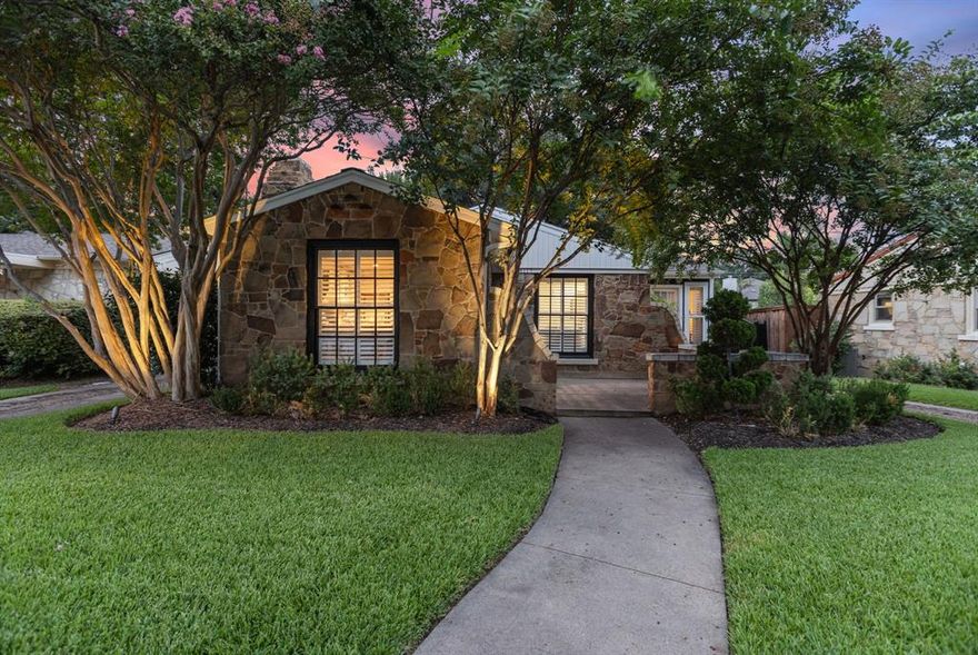 Located in Wilshire Heights, this move-in ready home offers storybook charm with modern comfort, convenience and high design. This two bed, two bathroom home has been updated with designer details while preserving the architectural integrity of the home. The beautiful kitchen was recently upgraded with new floors, countertops, backsplash, wallpaper, fixtures, and hardware. Just off the kitchen you’ll find a large laundry room which doubles as an option for a home office, drop zone or receiving area. The spacious primary bedroom features a stunning ensuite bath designed with dual sinks, walk-in shower, and separate soaking tub. The light-filled flex space is perfect for a home office, home gym, or tranquil sitting room. Idyllic outdoor living abounds on either the front sitting porch tucked behind a low privacy wall or on the block paver patio under the stately oak tree in the fully turfed and landscaped backyard. The driveway is equipped with an electric security gate leading to the detached carport which could be converted to an enclosed garage. This home is in close proximity to Greenville Avenue, White Rock Lake and mere blocks from Tietze Park. Close to all the best amenities East Dallas has to offer. See agent for a list of recent upgrades.