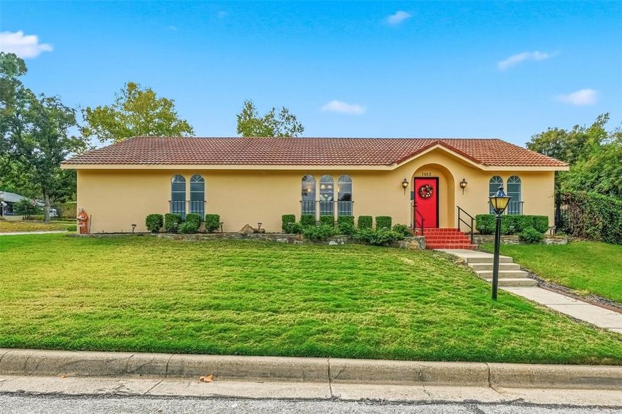 Welcome to 1803 Michael Ct in Elm Shadows Addition of Arlington. Unique home with exterior courtyards and wrought iron fencing. This large home is on one level and features a formal living room and formal dining room, large family room with built in bookshelves and 3 large bedrooms. This floorpan is very flexible, none like any home you have seen. 
Main bedroom has patio access, ensuite bathroom with glass shower door and large closet. Home amenities include coffee bar with built in shelves, tile inlaid bay window, marble flooring throughout, oversized garage, established landscaping, garden plots in one courtyard, lots of closets for storage, arched doorways. Kitchen features St Charles metal cabinets with pullout spice rack drawers, stainless steel built-in oven, smooth glass top stove, large pantry and breakfast area. Storage building in backyard. Near Downtown Arlington.