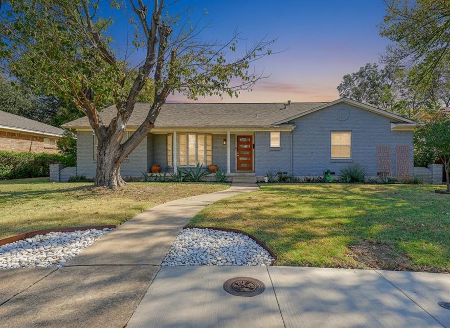 Must see! Stop renting! This updated home may be purchased with zero money out of pocket for qualified buyers. This property qualifies for down payment assistance, and the sellers are offering to cover closing costs. Located in sought-after Buckner Terrace, this one-story 3-bedroom, 2.1-bath home offers timeless updates and thoughtful touches throughout. Step inside to an airy, open floor plan filled with natural light. Wood flooring flows through the main areas, complemented by upgraded LED lighting and stylish modern fixtures. The living area features a freshly painted white brick fireplace with gas logs, a classic arched firebox, and a clean-lined mantle—ready to be enjoyed year-round. The updated kitchen is both functional and elegant, offering granite countertops, a gas cooktop, stainless steel appliances, and a sleek vent hood with stainless and glass finishes. Crisp white cabinetry and a spacious bar area make it easy to entertain, while the adjoining breakfast nook includes custom built-ins for added charm and storage.The spacious primary suite has been beautifully remodeled with marble tile, a walk-in shower behind glass doors, and a separate soaking tub. Additional bedrooms are generously sized with wood flooring and flexible layouts to suit your needs. The home also includes two full bathrooms and one half bath, each with granite counters and updated fixtures. Step outside to a private backyard retreat featuring multiple sitting areas, a wooden deck, and a pergola—perfect for enjoying warm evenings or morning coffee in a peaceful setting. Bonus: No HOA and a two-car garage add to the ease of ownership in this well-loved home. Transferable Home warranty to the buyer through 01.08.2027 with Choice Home Warranty!