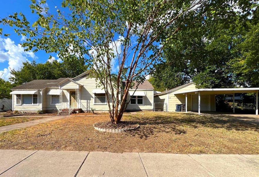 Property features fresh interior paint, Hardwood floors, new vinyl plank in kitchen and bath, gas stove, dishwasher, 1 mini-split with heat & air in living area, 2 window units in bedrooms, 2 window units, ceiling fans, electric wall heaters in every bedroom, along with 2 space heaters, 2 carport spaces, 1 car garage with opener, washer & dryer connections in garage, rear covered patio 8x20, fenced in oversized backyard. Bedroom 2 and Primary Bedroom connected, must walk through bedroom 2 to get into primary bedroom. Easy access to 287, 820, schools, dining and shopping. Does NOT accept Section 8 Housing or any assistance.