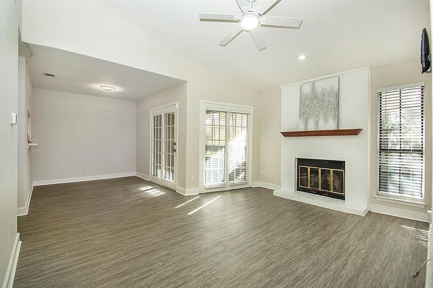 AMAZING LOCATION. Basically across the street from SIX FLAGS at I-30 and Collins. Central to AT&T STADIUM, RANGERS BALLPARK, WET & WILD, UTA, and ARLINGTON ENTERTAINMENT DISTRICT, with a wide variety of restaurants and retail.  A quick 15 minute Uber ride to DFW Airport and equidistant between Dallas and Fort Worth.
Condo is freshly painted with quartz countertops in kitchen and bathrooms. COLOR OF ALL CABINETS IS GRAY.  They are appearing green in photos. Stylish vinyl plank in main living areas with carpet in bedrooms.  Refrigerator and washer dryer included. You will be ready for hot summer days with 2 BEAUTIFUL POOLS in complex - and view of one from bedroom window. Owners have lovingly cared for property with new air handler installed in 2022, insulation added in attic, and cleaning of air ducts in 2023.
MOVE-IN READY TODAY.  Don't miss your chance to live in one of the most popular areas in all of DFW!  Eligible for MIDTERM RENTALS. Shortest term rental per HOA is 30 days.