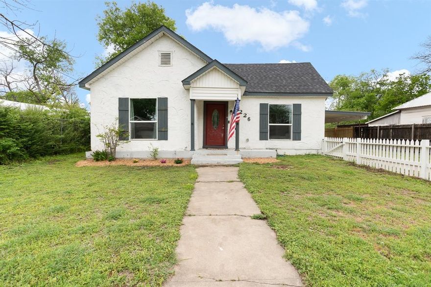 Welcome home to this charming 1950's bungalow in historic Cleburne.  Full updates seamlessly blend vintage charm with modern amenities.  Offering an inviting curb appeal, the exterior features a unique stucco finish, beautiful landscaping and a new white picket fence.  Step inside to discover a completely renovated interior.  You will love the high ceilings and the abundance of windows that offer tons of natural light.  The adorable kitchen has Corian countertops and a huge island and access to the covered carport and backyard. Nice stainless steel refrigerator stays.  Enjoy outdoor living in the expansive backyard with oversized storage building and large covered carport. Every inch of this home has been updated, including the HVAC system. Conveniently located near restaurants, shopping and parks, this home offers the opportunity to experience all the charm and history that Cleburne has to offer.  Don't miss your chance to own this beautifully restored gem.