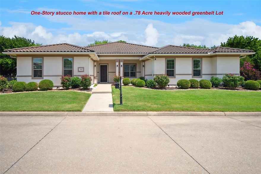 OPEN HOUSE SUNDAY OCT 19 1 to 3 pm. Exceptional Contemporary One-Story stucco home with a tile roof  on a .78 Acre heavily wooded greenbelt Lot. Within walking distance to TPC Craig Ranch Golf & Country Club—host of the Byron Nelson Golf Tournament. Designed for modern living & entertaining, this home combines timeless elegance with functionality in every detail. Spacious, Light-Filled Layout - This thoughtfully designed custom home features an open-concept floor plan filled with natural light, creating a seamless flow between living, dining, & kitchen areas—perfect for both everyday living and hosting guests. Dream Kitchen – The Heart of the Home Ideal for culinary enthusiasts and entertainers alike. A chef’s delight, A massive center island, Farmhouse sink, cooktop (plumbed for gas), Double ovens, Extensive counter space & cabinetry, Large breakfast room with bay windows & a built-in desk.  Bedrooms & Flexible Living - All bedrooms are generously sized, offering comfort & flexibility, The 4th bedroom can easily serve as a private study.  The primary suite overlooks the greenbelt and features a huge walk-in closet & spa-like oversized shower. The game room includes tray ceilings & French doors, ideal for use as a second office, playroom, or entertainment space. Outdoor Living at Its Best - Enjoy ultimate privacy with no homes directly behind. The extended covered patio offers peaceful views & ample space for relaxing or entertaining. The backyard is the largest in the subdivision, surrounded by mature trees & greenbelt, providing a serene, park-like setting. Additional Highlights - Wood flooring throughout, Mudroom with built-in shelves & hooks, Utility room with sink, Arched doorways, elegant moldings, & custom finishes, Covered front porch with built-in fireplace, 3-car garage, Wired (CAT6),, Frisco ISD . Convenient access to Highway 121, premier shopping, dining, & recreational amenities make this home a rare find in a highly sought-after community.